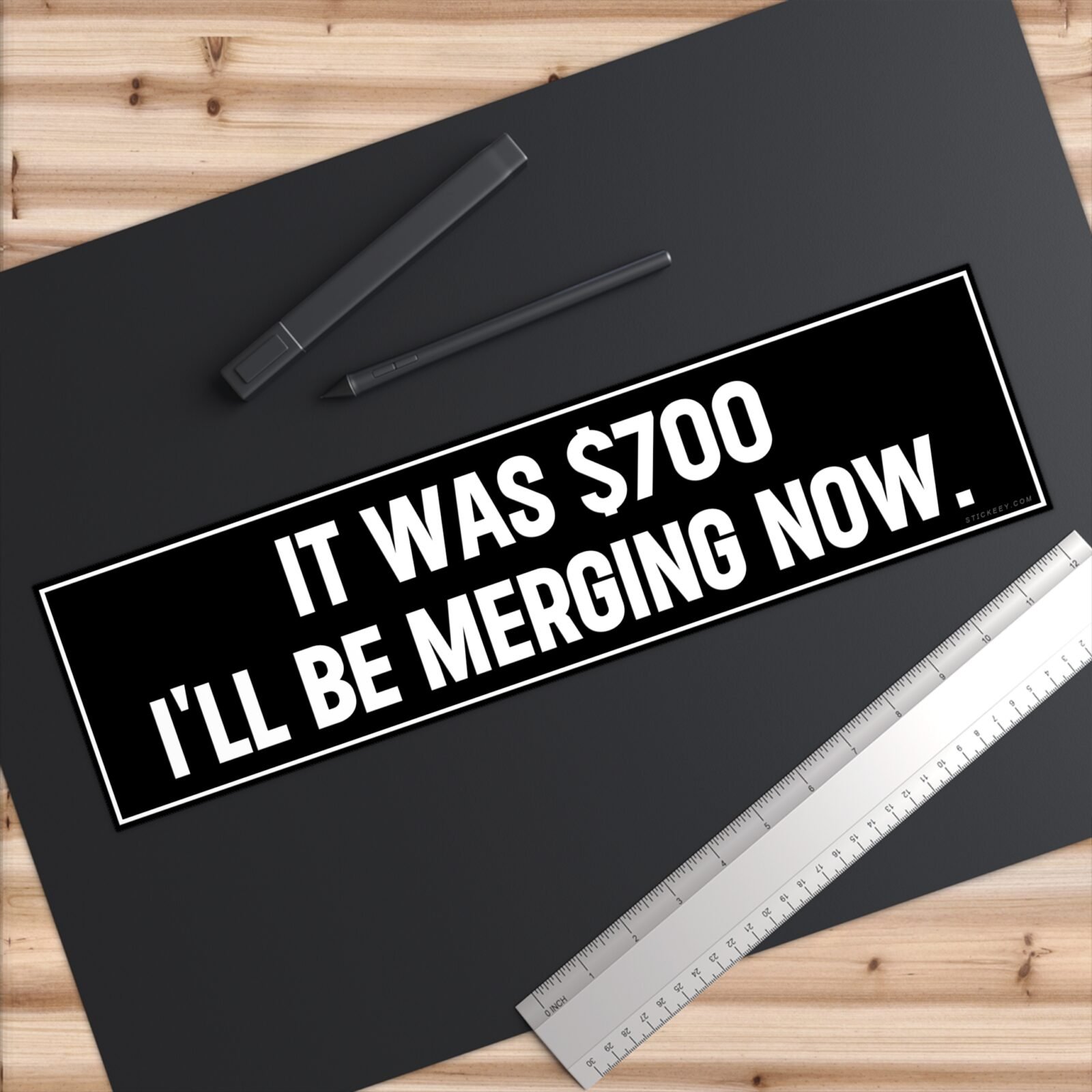 It cost $700 I'll Be Merging Now Bumper Sticker
